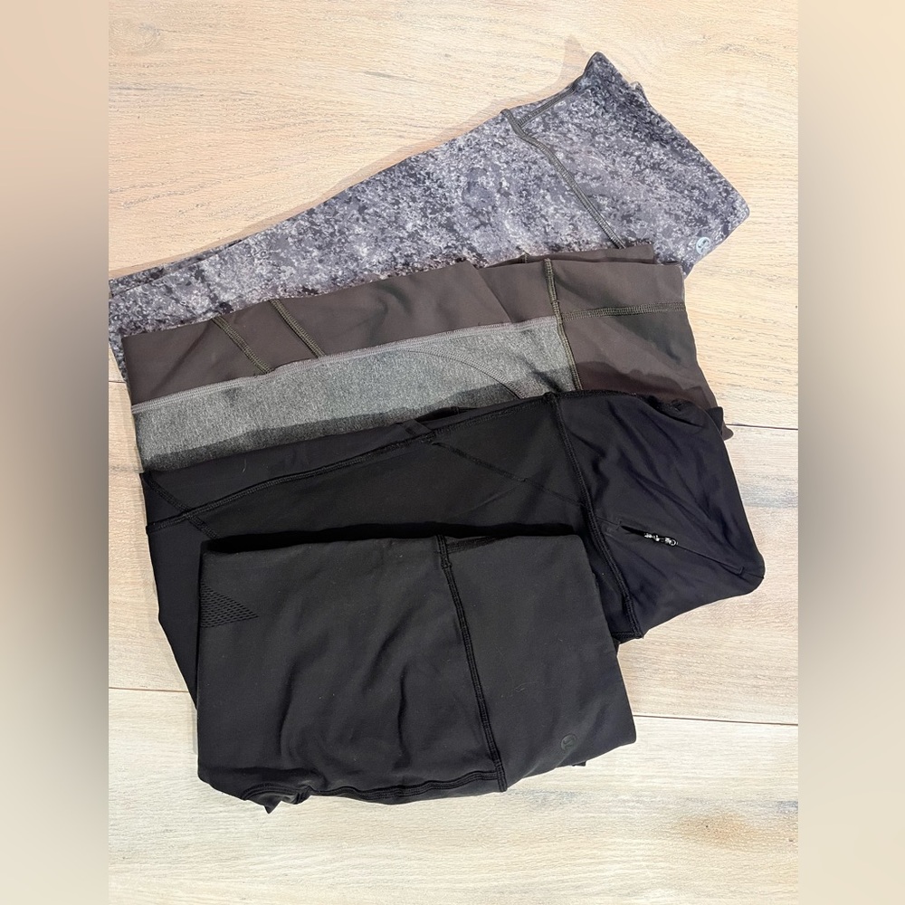 Four pair Lululemon/Athleta Leggings